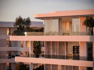 An exterior building render of the upper levels of Pafilia Plaza.