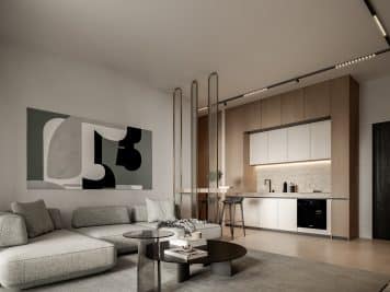 An interior shot of the kitchen area of a luxury apartment taken from the living room at Pafilia Plaza.