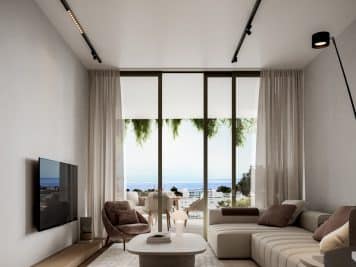 the living room view looking out at the balcony and the incredible seaview of the Mediterranean.
