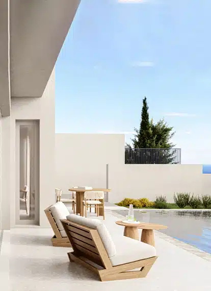 The outdoor seating area at Coral Vista Villas in Paphos, Cyprus with the pool visible