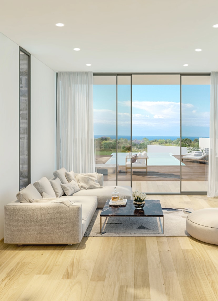 A living room photo from Olea Residences looking out over the sea in Paphos, Cyprus