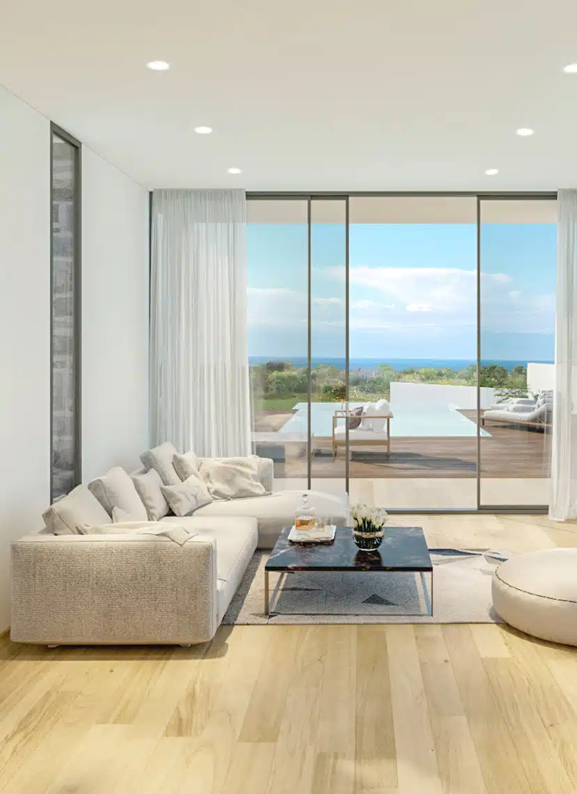 A living room photo from Olea Residences looking out over the sea in Paphos, Cyprus