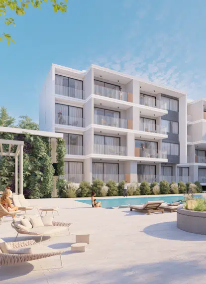 The pool area at Elysia Blu with luxury apartments for sale visible in the background