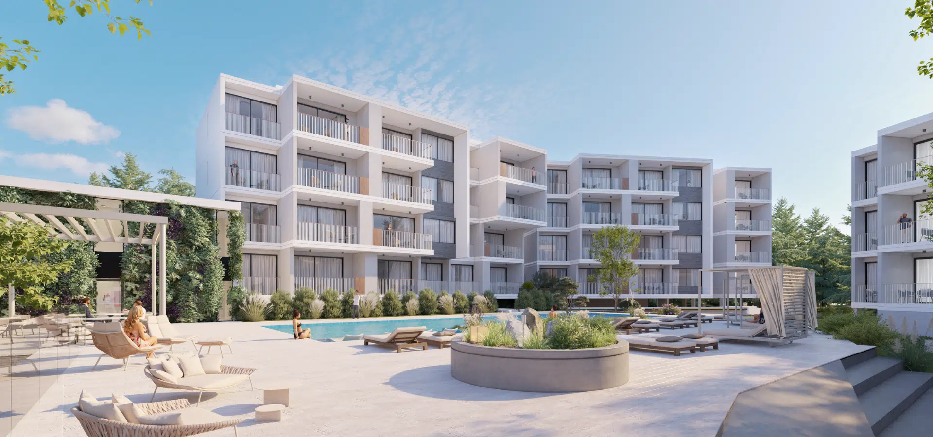 The pool area at Elysia Blu with luxury apartments for sale visible in the background